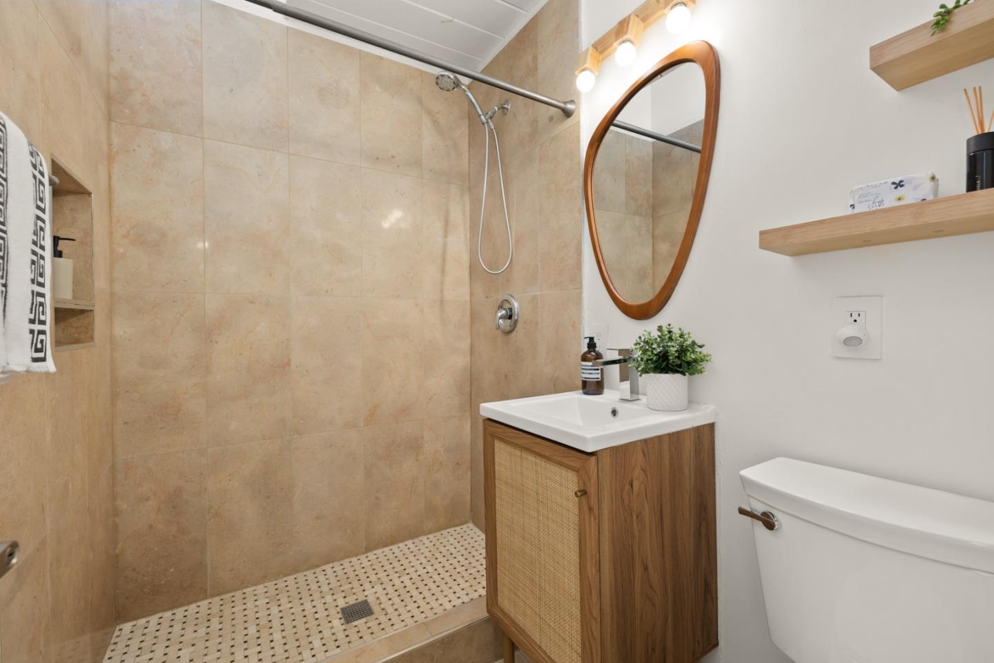 2443 Thaddeus Drive Mountain View, CA 94043 - Photo 16 of 38 a bathroom with a sink a toilet and a mirror