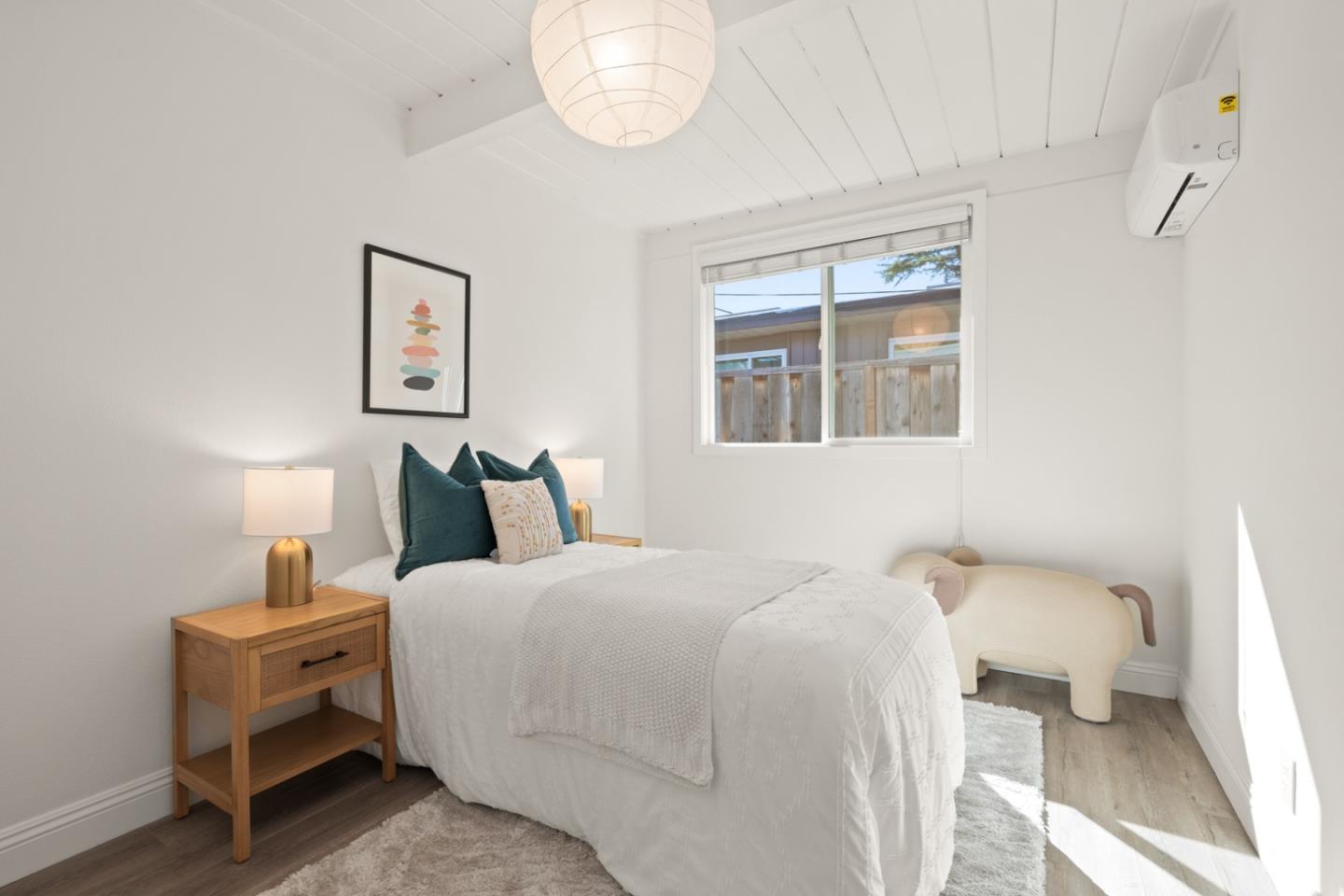 2443 Thaddeus Drive Mountain View, CA 94043 - Photo 17 of 38 a bedroom with a bed and a window