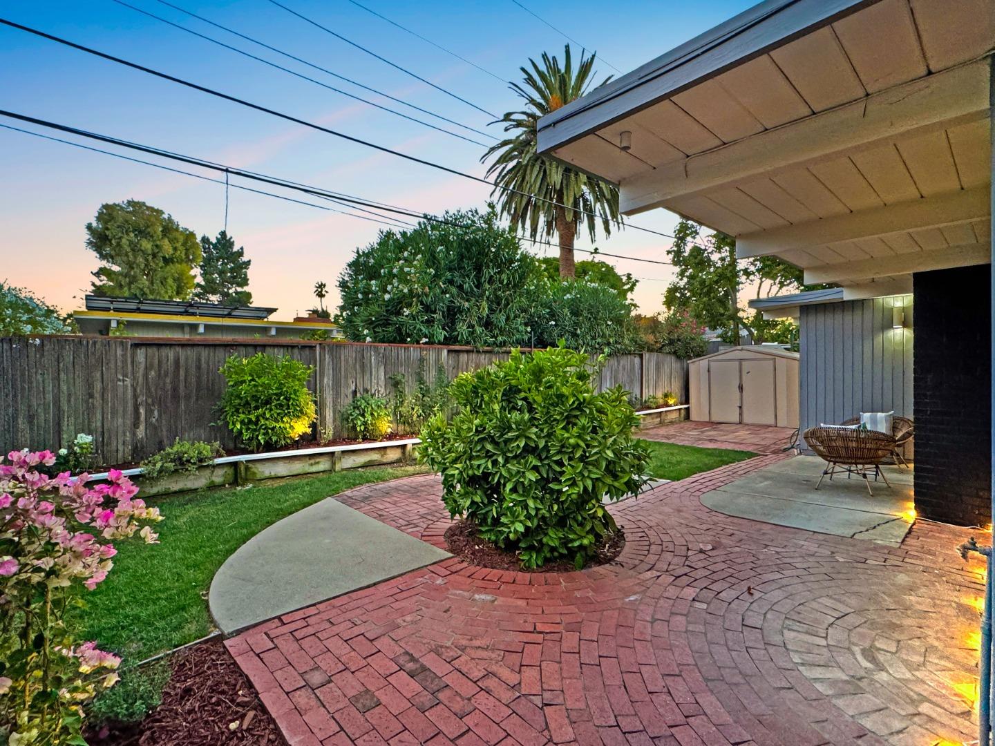 2443 Thaddeus Drive Mountain View, CA 94043 - Photo 28 of 38 a view of a backyard with plants and a patio