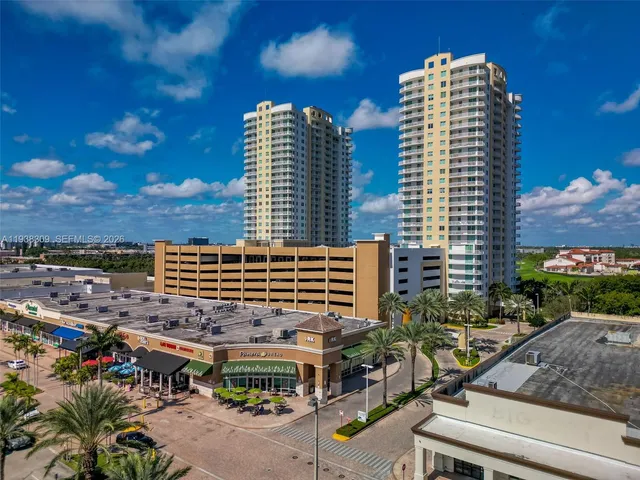 a view of a city with tall buildings