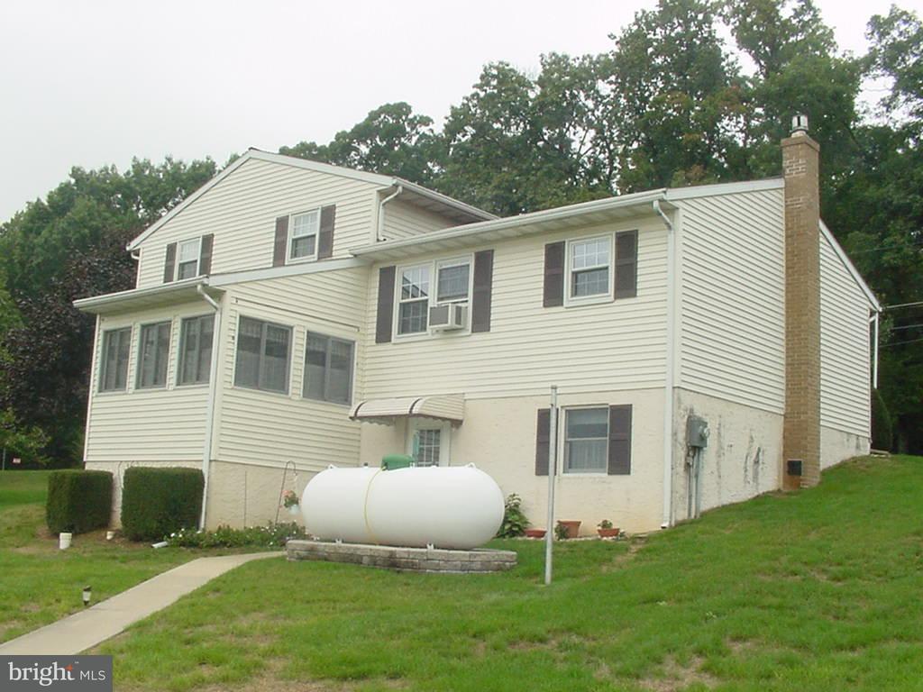726 West Brubaker Valley Road Lititz, PA 17543 - Photo 2 of 3 a view of a white house with a table and chairs