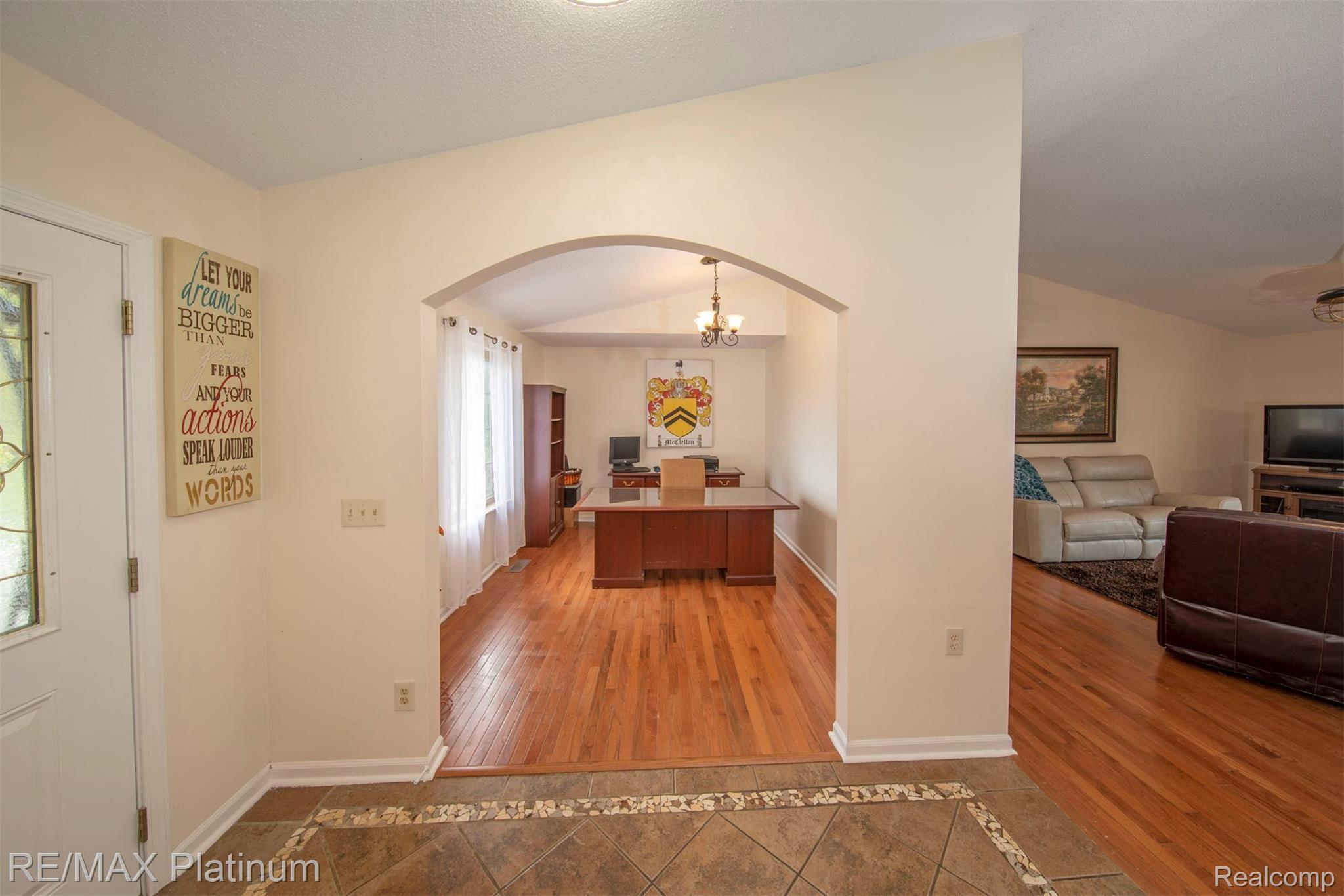 542 South Hughes Road Howell, MI 48843 - Photo 3 of 26 Entry Way looking into Den