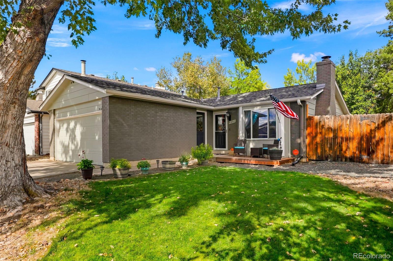 a front view of a house with patio