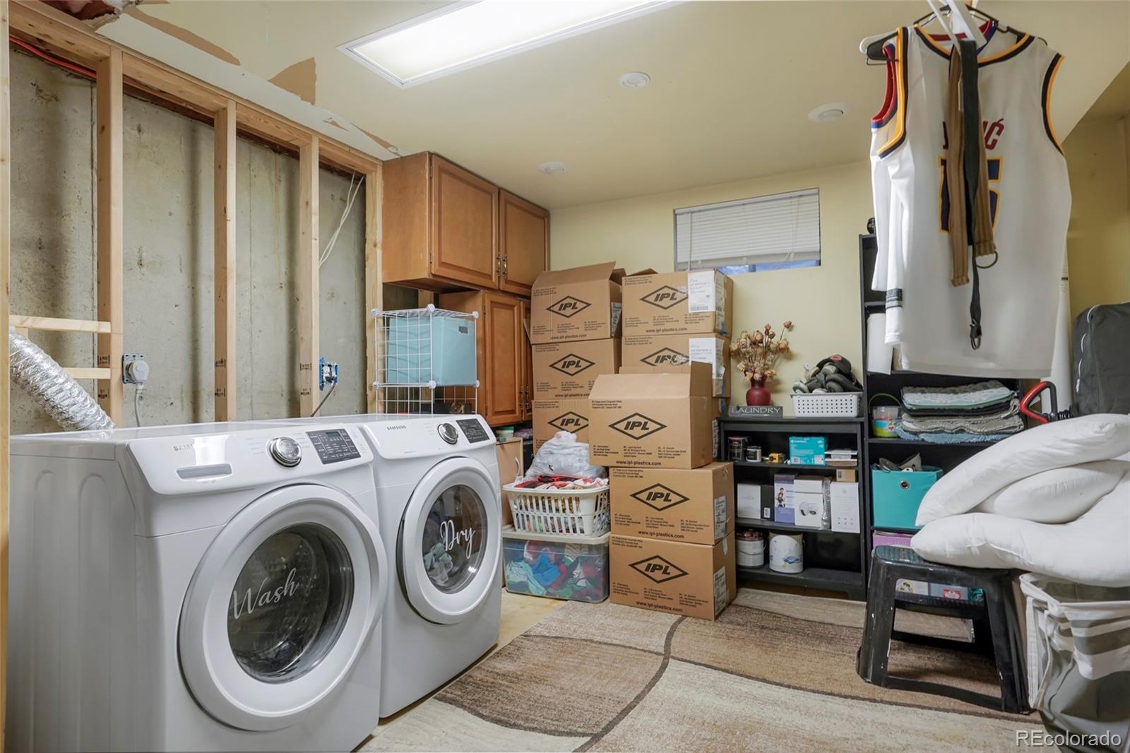 9201 West 104th Place Westminster, CO 80021 - Photo 24 of 29 a utility room with dryer and washer
