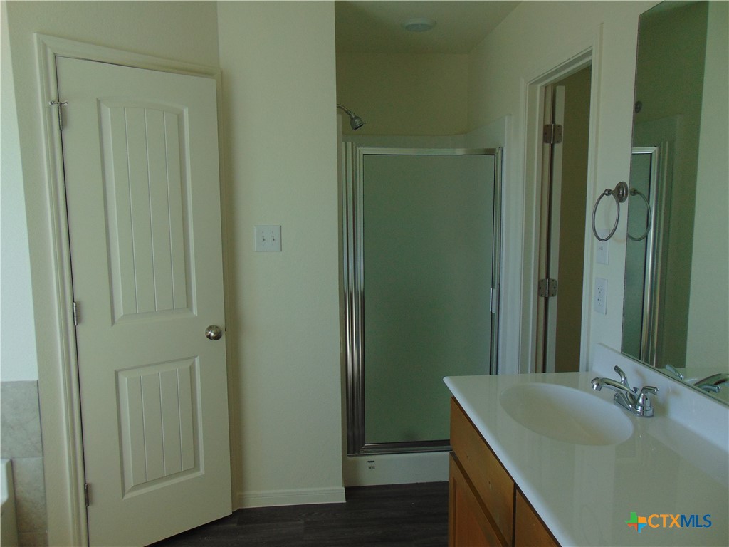 3202 Salt Fork Drive Killeen, TX 76549 - Photo 16 of 25 a bathroom with a sink and shower