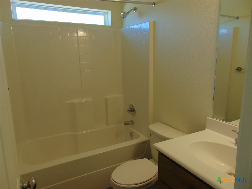 3202 Salt Fork Drive Killeen, TX 76549 - Photo 19 of 25 a bathroom with a sink and a toilet