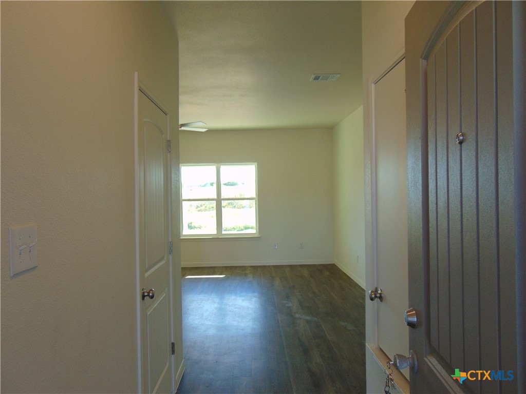 3202 Salt Fork Drive Killeen, TX 76549 - Photo 2 of 25 a view of hallway with hardwood floor and window