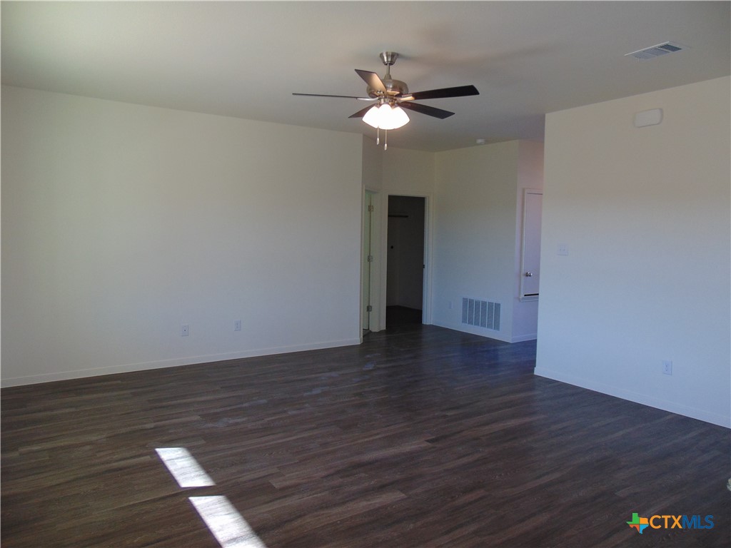 3202 Salt Fork Drive Killeen, TX 76549 - Photo 5 of 25 a view of an empty room with wooden floor
