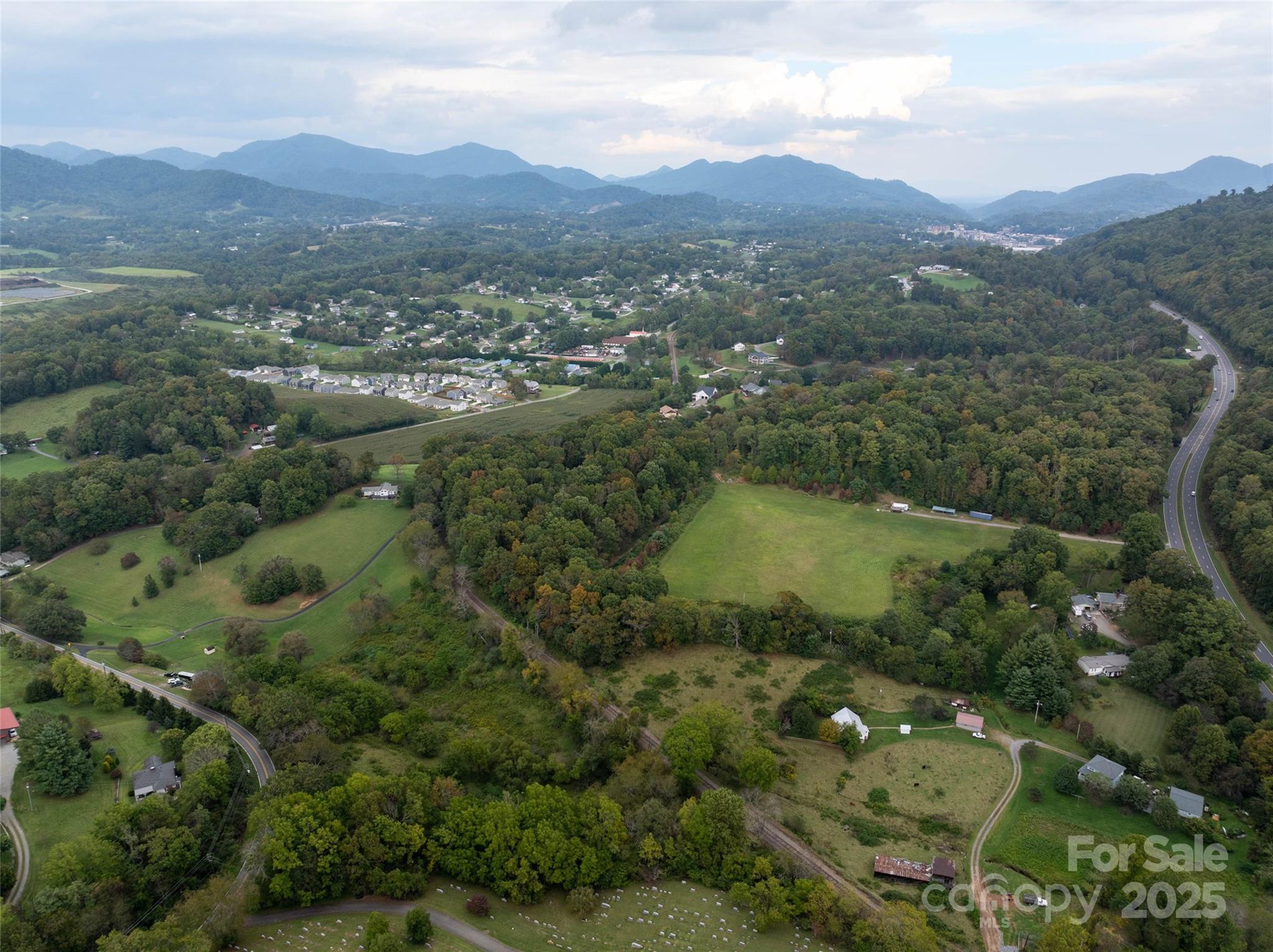 99999 Old Clyde Road Clyde, NC 28721 - Photo 14 of 15 an aerial view of mountains residential house and green space