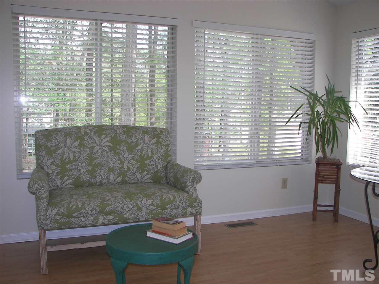 5016 Raintree Road Durham, NC 27712 - Photo 11 of 22 a living room with furniture and a large window