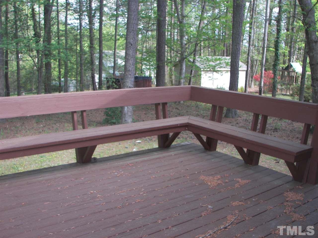 5016 Raintree Road Durham, NC 27712 - Photo 21 of 22 a view of a bench in the yard