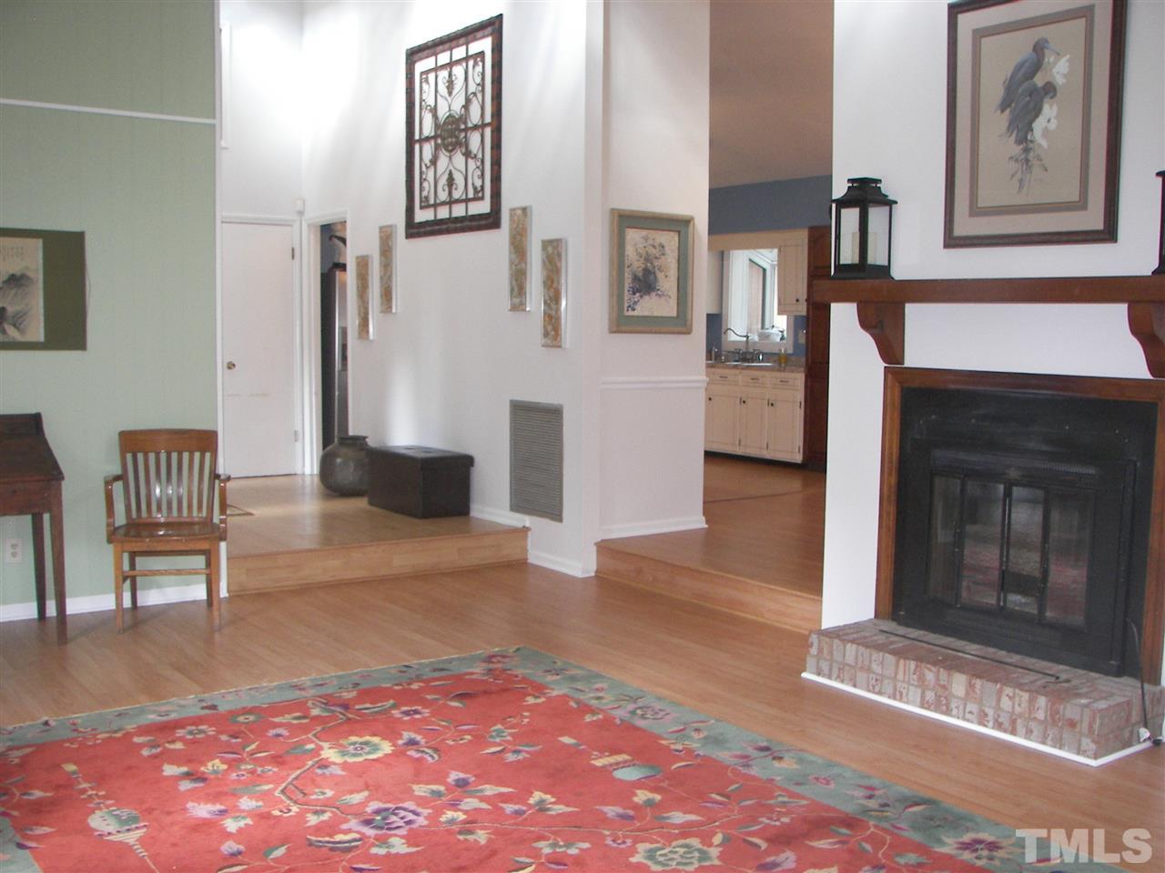 5016 Raintree Road Durham, NC 27712 - Photo 5 of 22 a view of an entryway with furniture