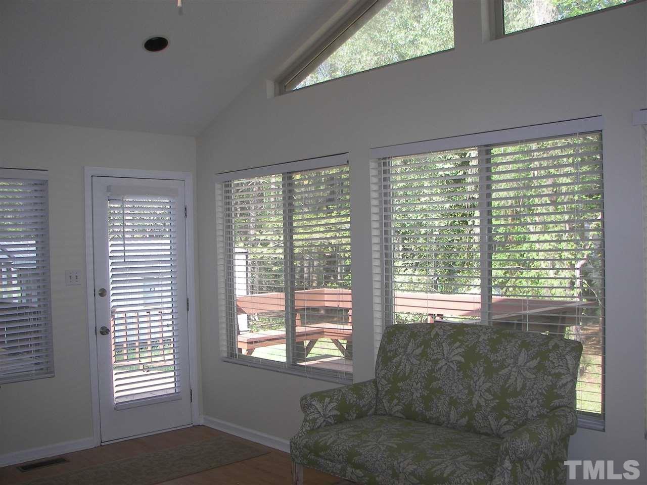 5016 Raintree Road Durham, NC 27712 - Photo 10 of 22 a living room with furniture and a window