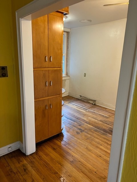 2838 West Addison Street, Unit 2S Chicago, IL 60618 - Photo 11 of 15 a view of empty room with wooden floor