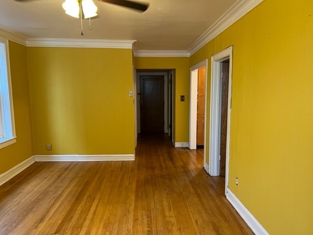 2838 West Addison Street, Unit 2S Chicago, IL 60618 - Photo 5 of 15 a view of a room with wooden floor
