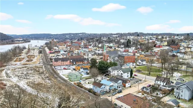 a view of a lake in middle of the town