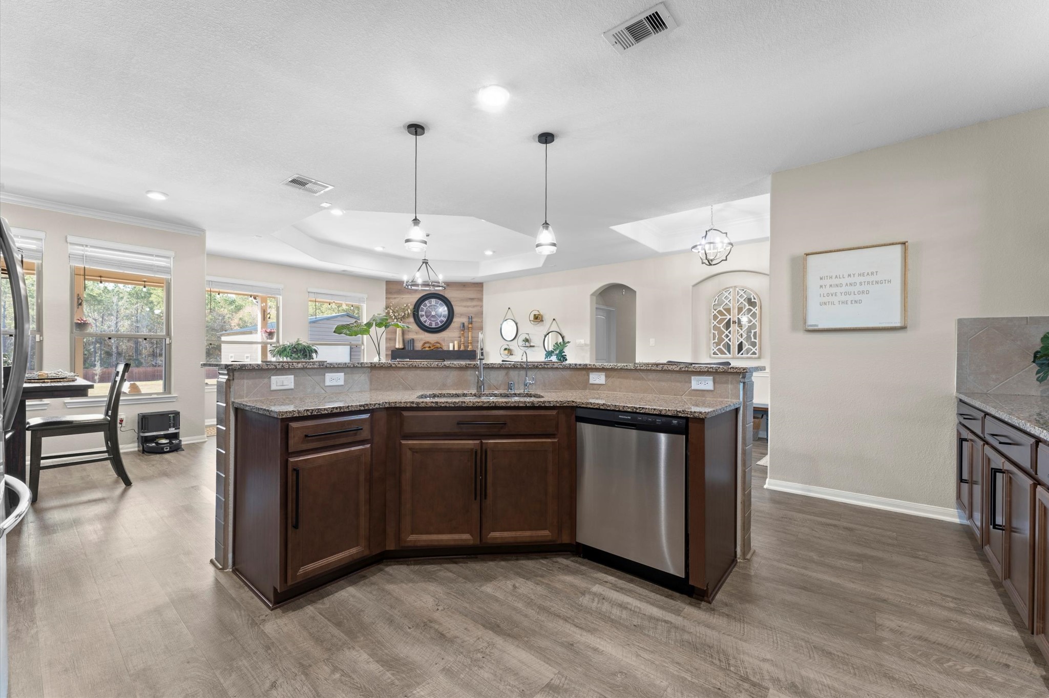 9729 Hidalgo Street Conroe, TX 77303 - Photo 17 of 38 View from the spacious kitchen into the open, bright and inviting living area.