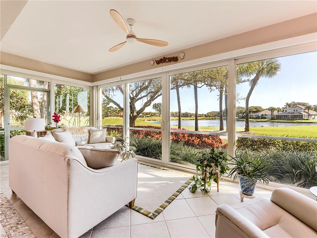 23011 Rosedale Drive, Unit 101 Estero, FL 34135 - Photo 6 of 34 a living room with furniture and a large window