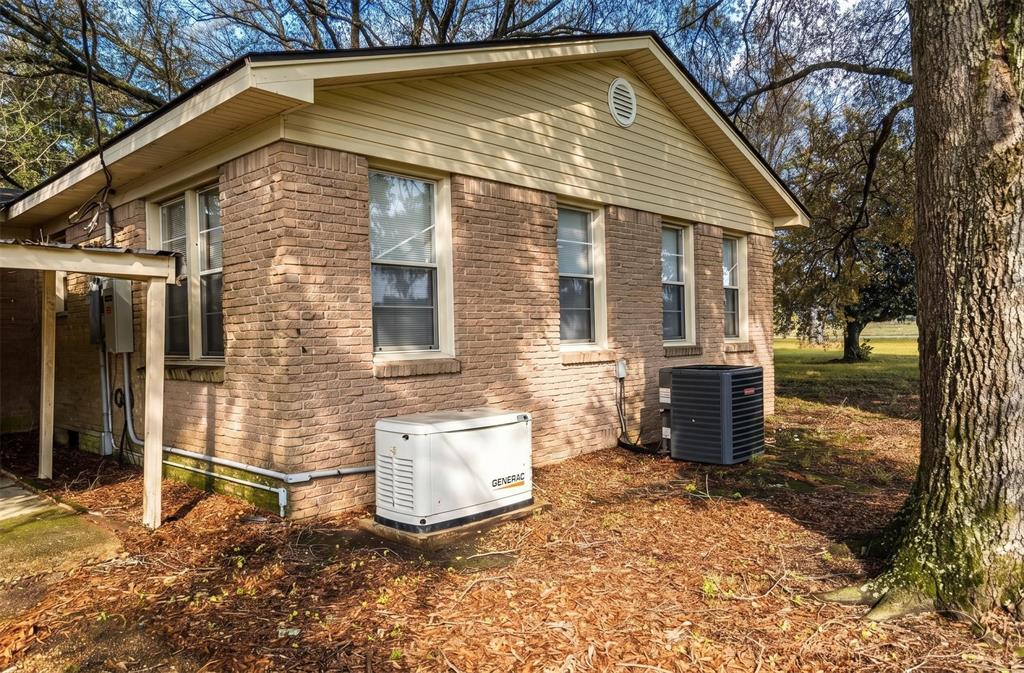 1925 Highway 527 Elm Grove, LA 71051 - Photo 2 of 15 a front view of a house with a yard