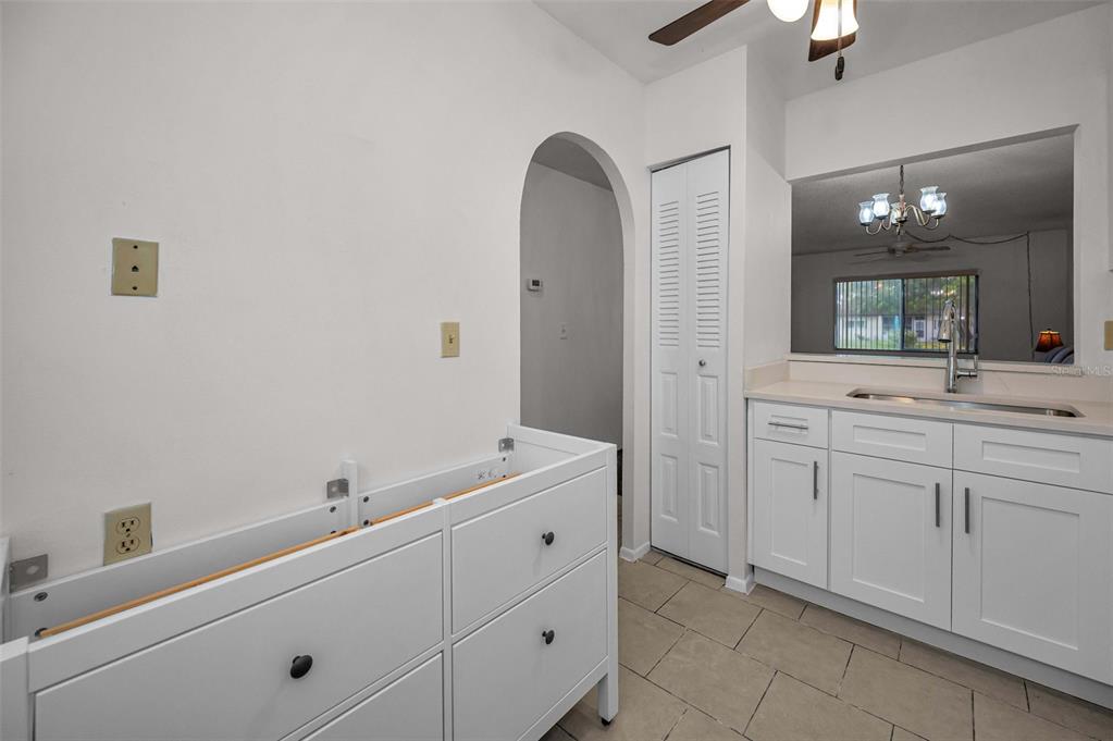 3116 Highlands Boulevard, Unit 3116 Palm Harbor, FL 34684 - Photo 17 of 56 a spacious bathroom with a double vanity sink and mirror