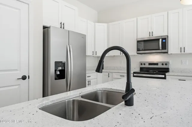 a view of a chairs and with a small yard