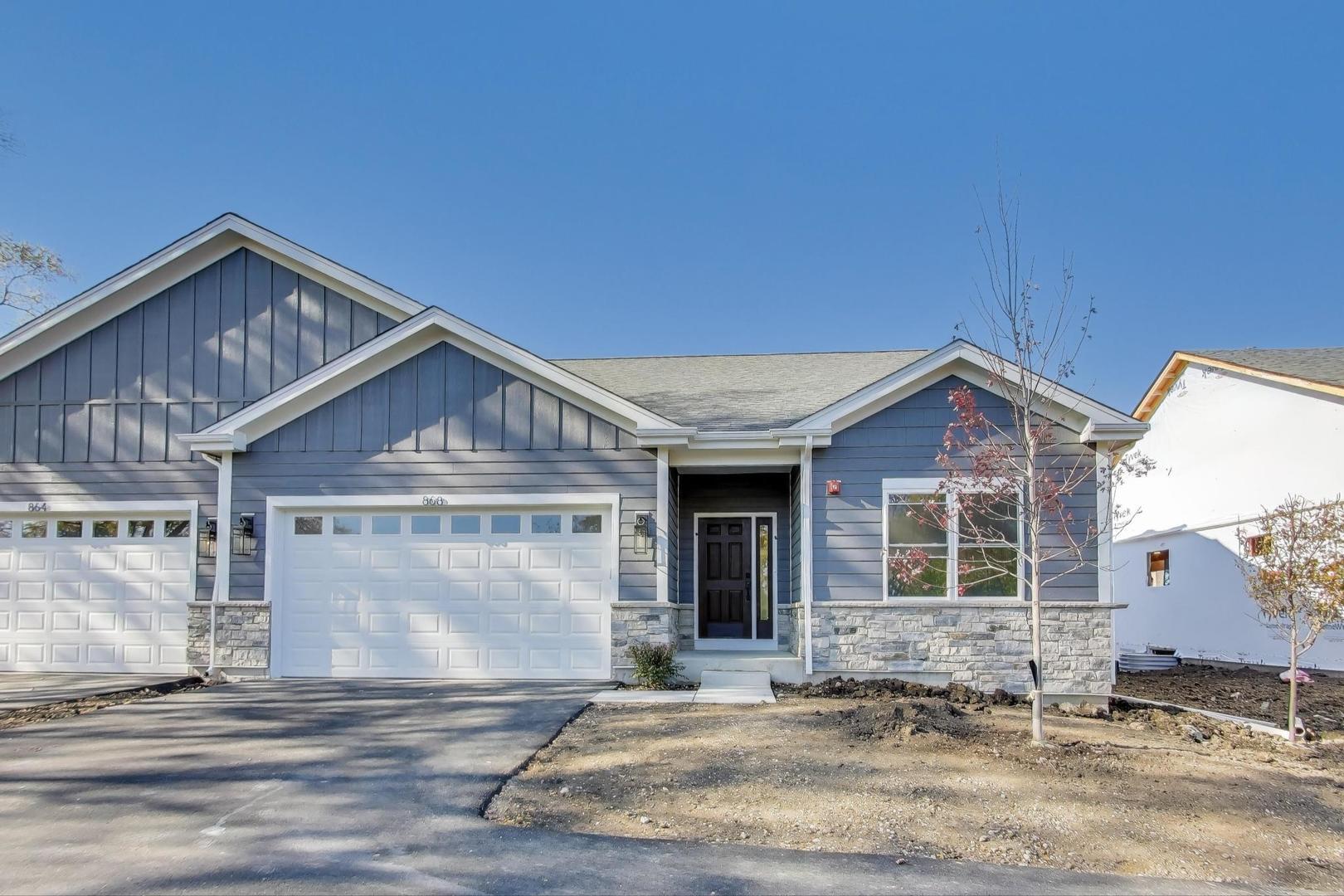898 North Quentin Road Palatine, IL 60067 - Photo 1 of 28 a view of a house with a yard