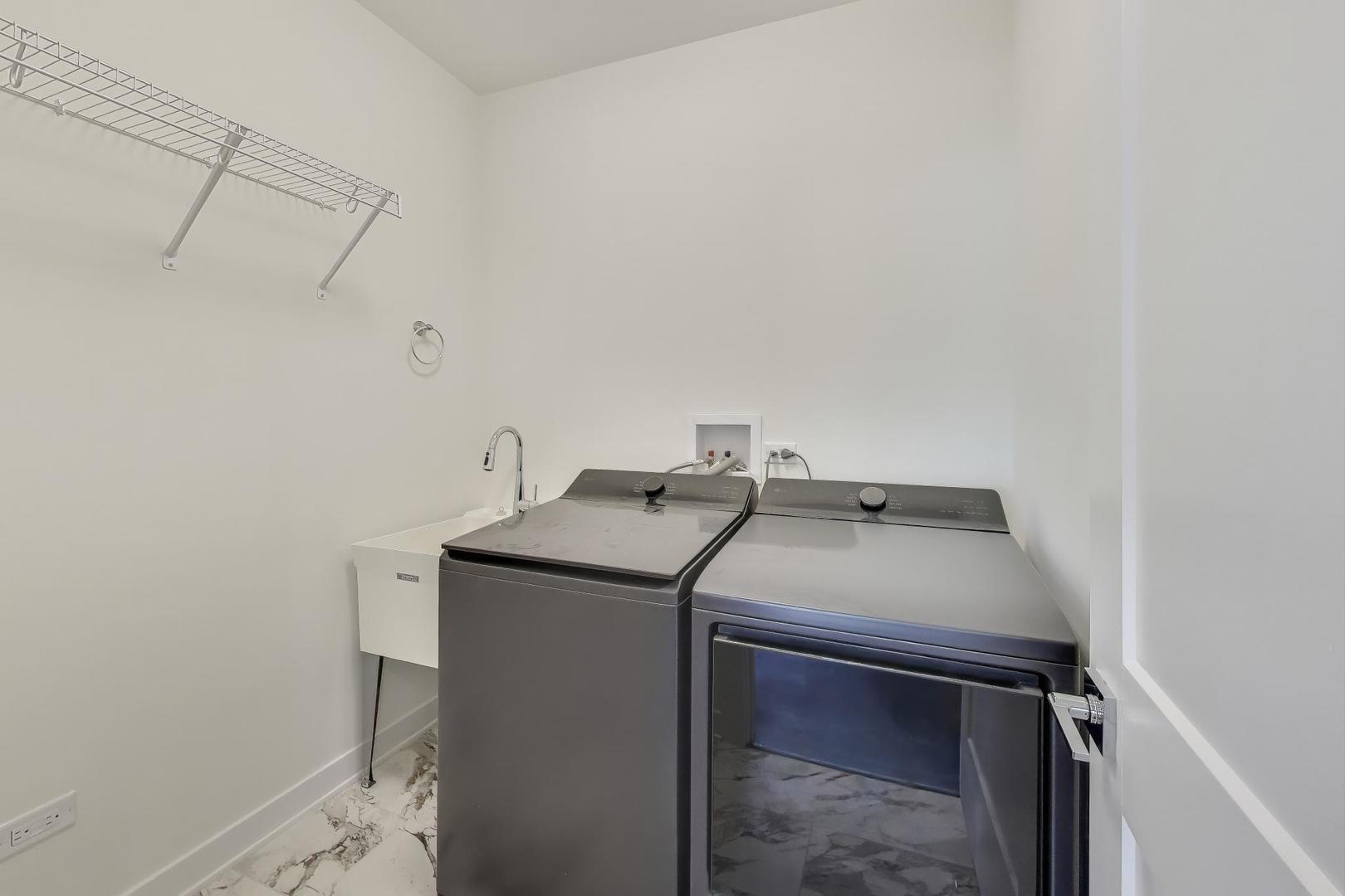 898 North Quentin Road Palatine, IL 60067 - Photo 23 of 28 a utility room with dryer and washer