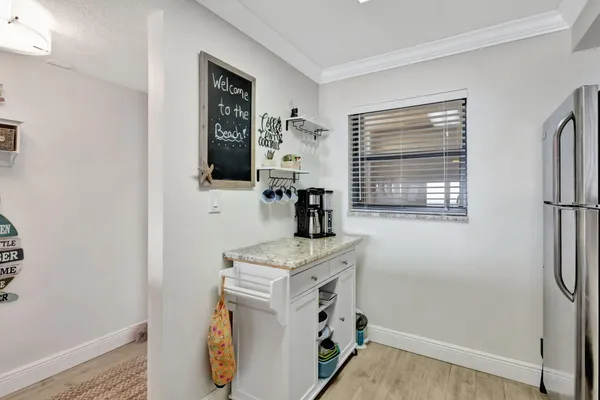 a room with cabinets and wooden floor