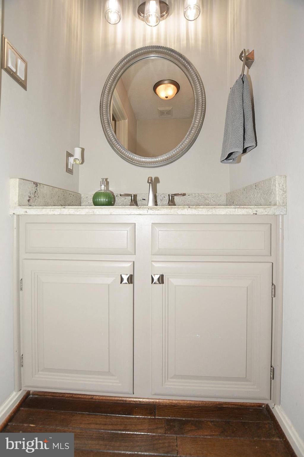 81 Rutherford Circle Sterling, VA 20165 - Photo 27 of 55 Powder room on main level