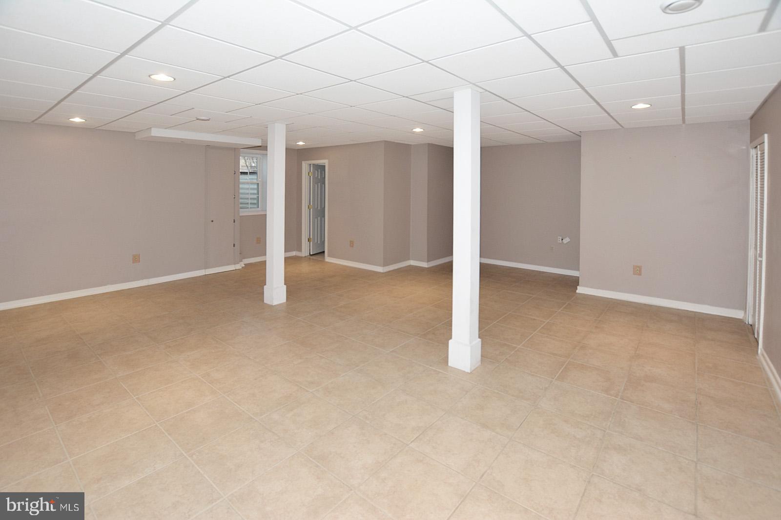 81 Rutherford Circle Sterling, VA 20165 - Photo 46 of 55 Egress in lower level, potential for 5th bedroom