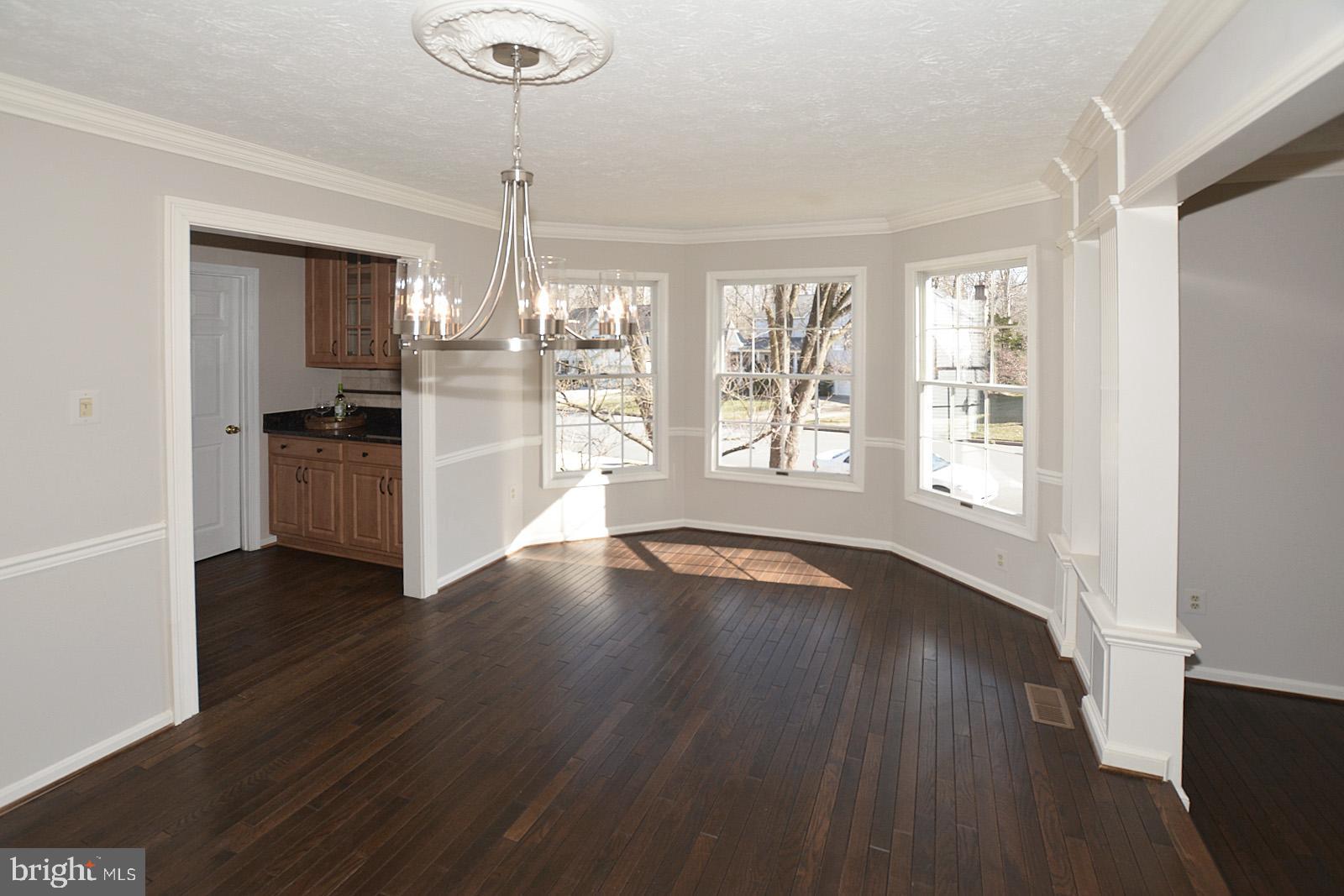 81 Rutherford Circle Sterling, VA 20165 - Photo 10 of 55 Dining room with new chandelier and bay window