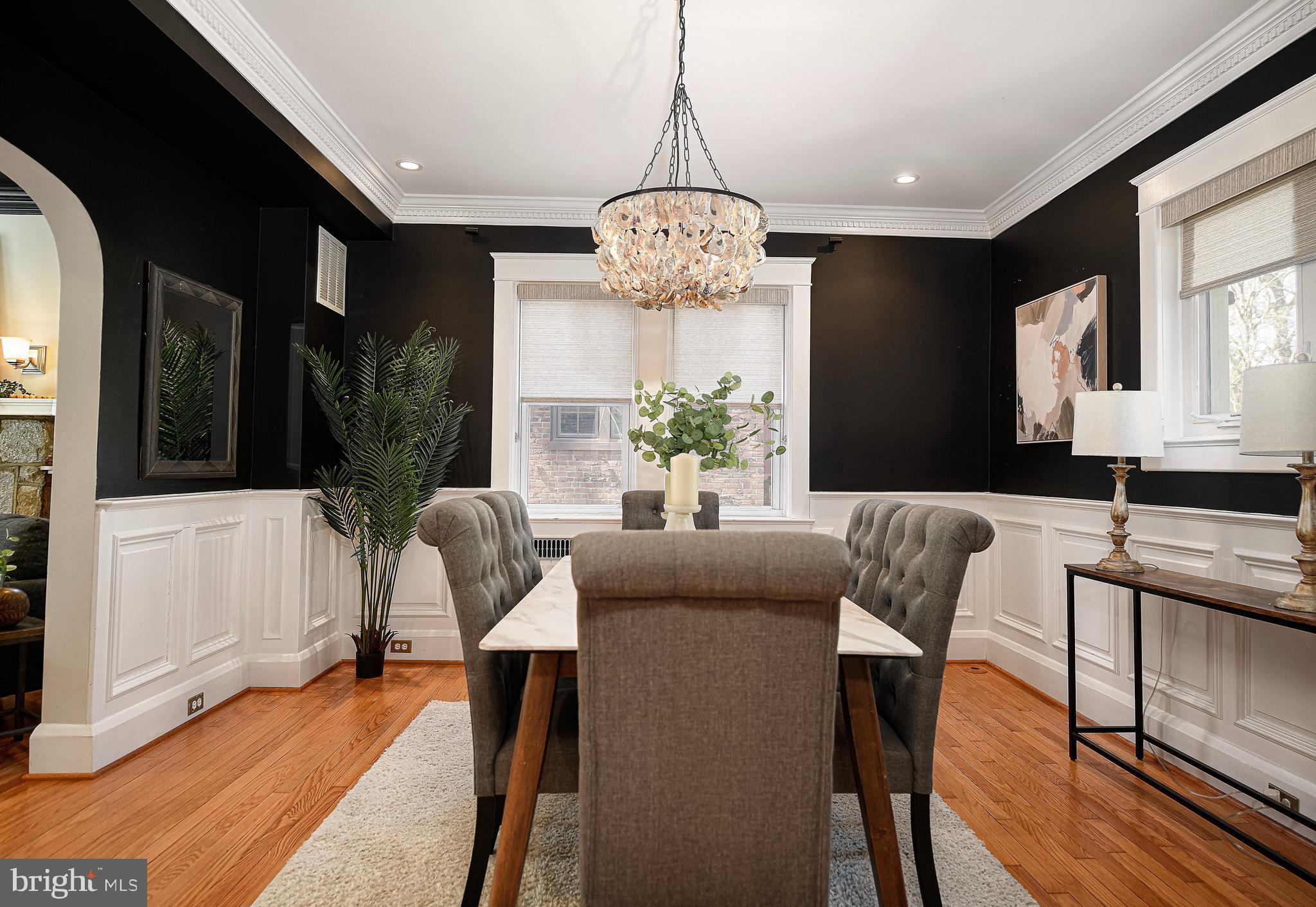 722 Anneslie Road Baltimore, MD 21212 - Photo 17 of 46 a view of a dining room with furniture window and wooden floor