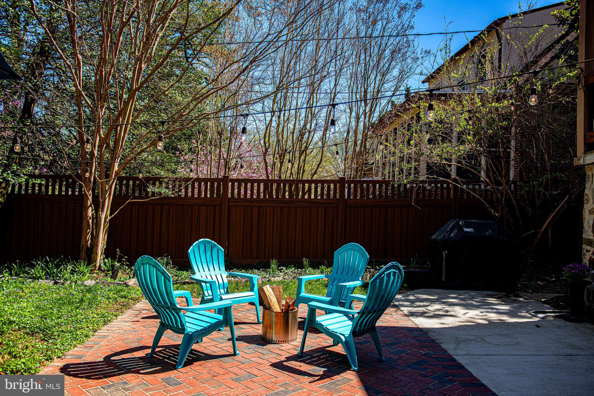 722 Anneslie Road Baltimore, MD 21212 - Photo 43 of 46 a view of a chairs and table in backyard of the house