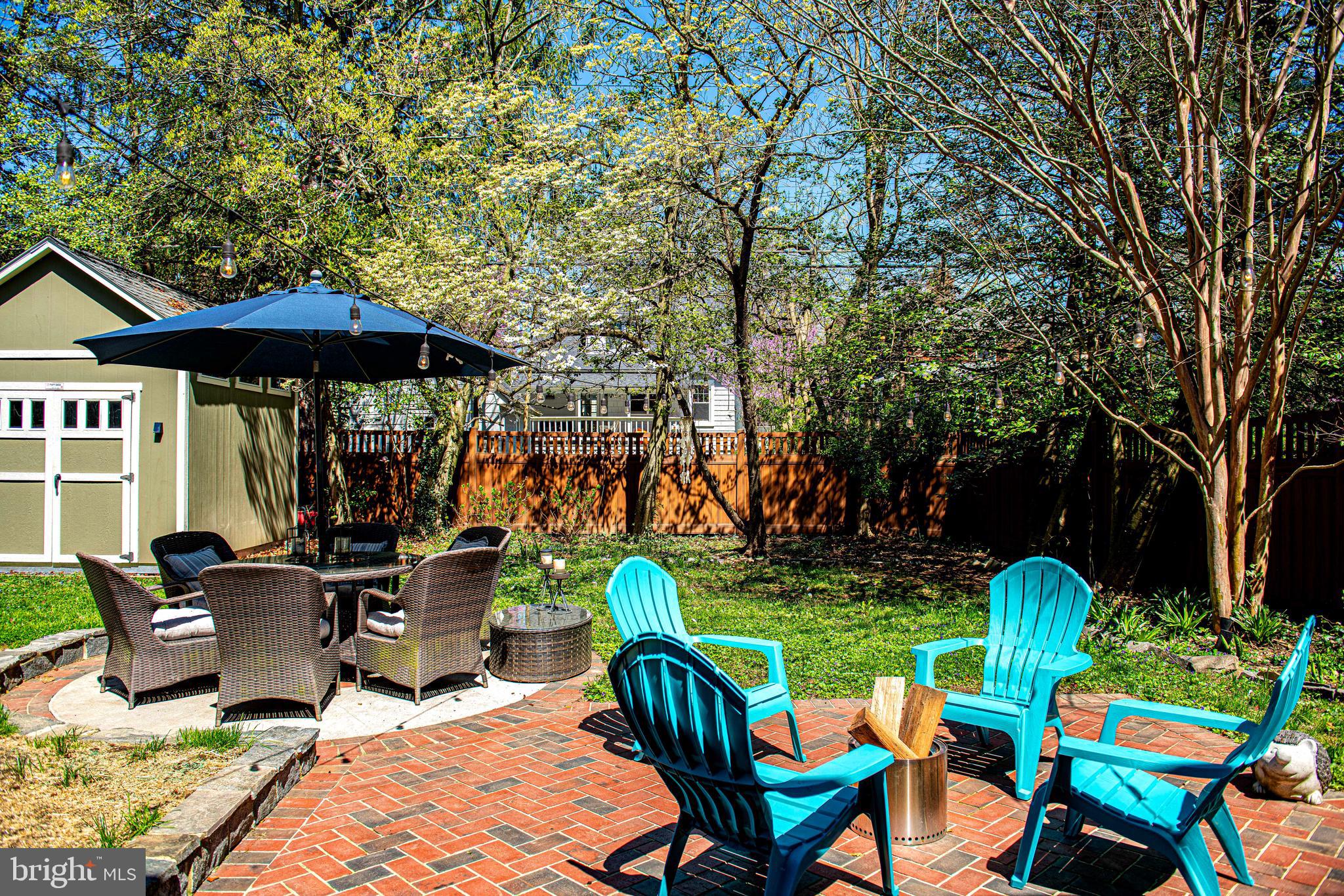 722 Anneslie Road Baltimore, MD 21212 - Photo 44 of 46 a view of a chairs and table in the patio and a garden