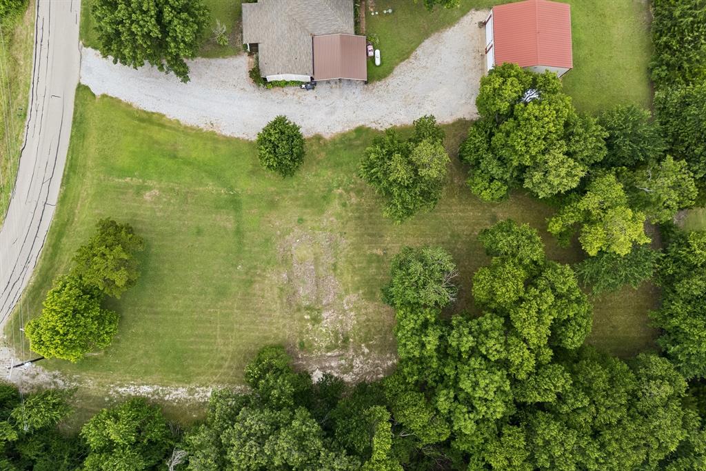 286 West Forest Grove Road Lucas, TX 75002 - Photo 12 of 23 an aerial view of residential house with pool and yard