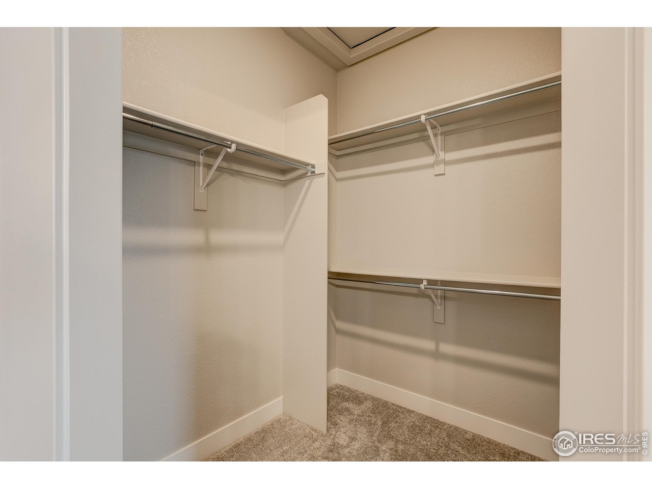 265 High Point Drive, Unit 203 Longmont, CO 80504 - Photo 13 of 24 a view of an empty walk in closet