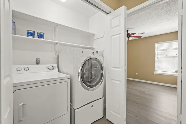 a utility room with dryer and washer