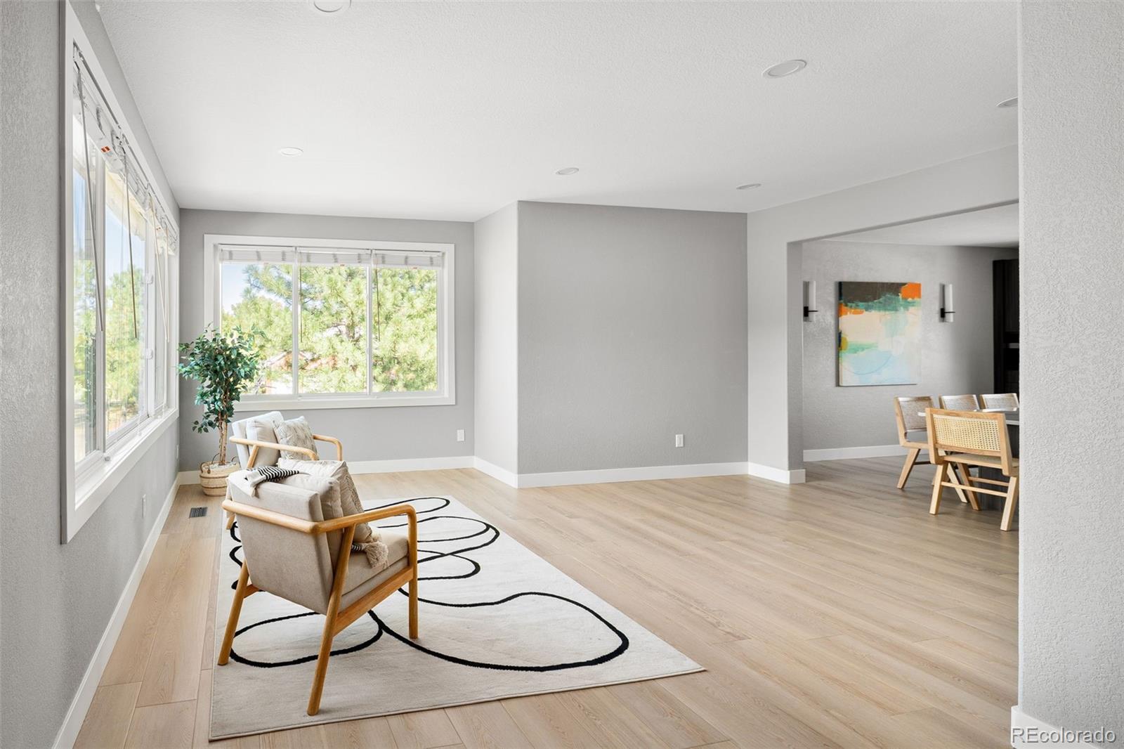 7400 South Genoa Circle Centennial, CO 80016 - Photo 18 of 50 a living room with furniture and a window