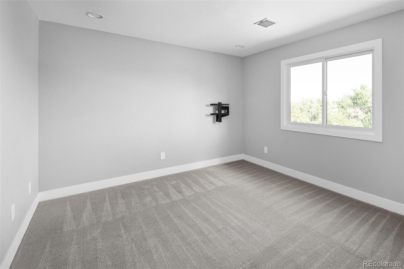 7400 South Genoa Circle Centennial, CO 80016 - Photo 30 of 50 an empty room with a window