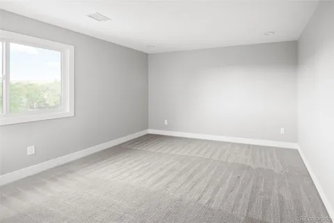 a bathroom with a shower and toilet