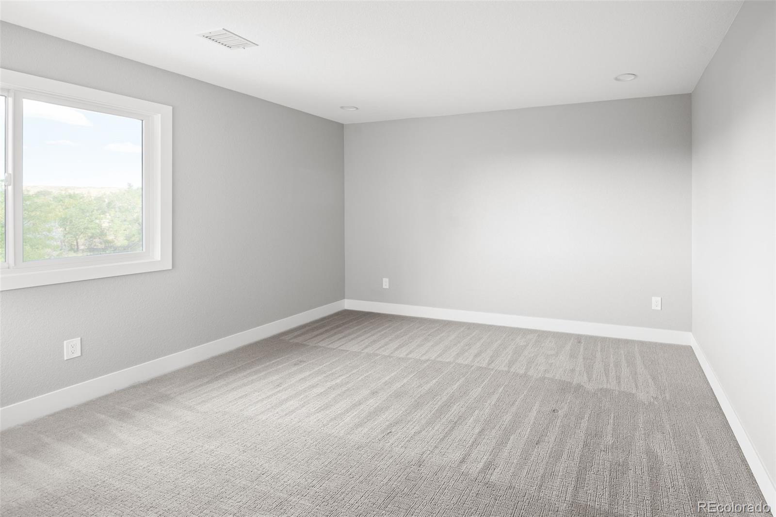7400 South Genoa Circle Centennial, CO 80016 - Photo 31 of 50 an empty room with a window