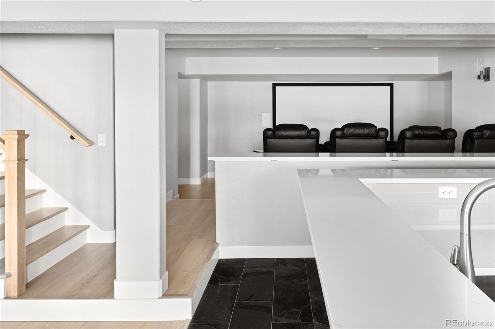 7400 South Genoa Circle Centennial, CO 80016 - Photo 34 of 50 a kitchen with a refrigerator and a sink