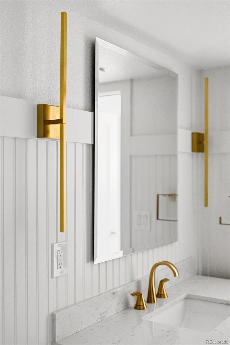 7400 South Genoa Circle Centennial, CO 80016 - Photo 40 of 50 a close view of a sink and tap