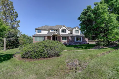 a room with a chair and a wooden floor