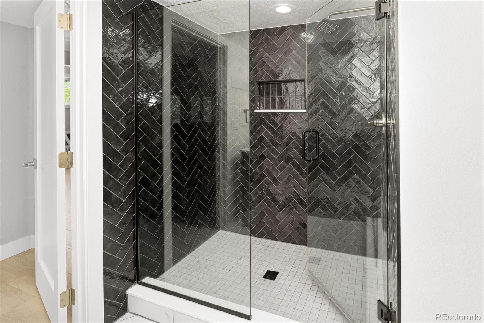 7400 South Genoa Circle Centennial, CO 80016 - Photo 41 of 50 a bathroom with a shower and toilet