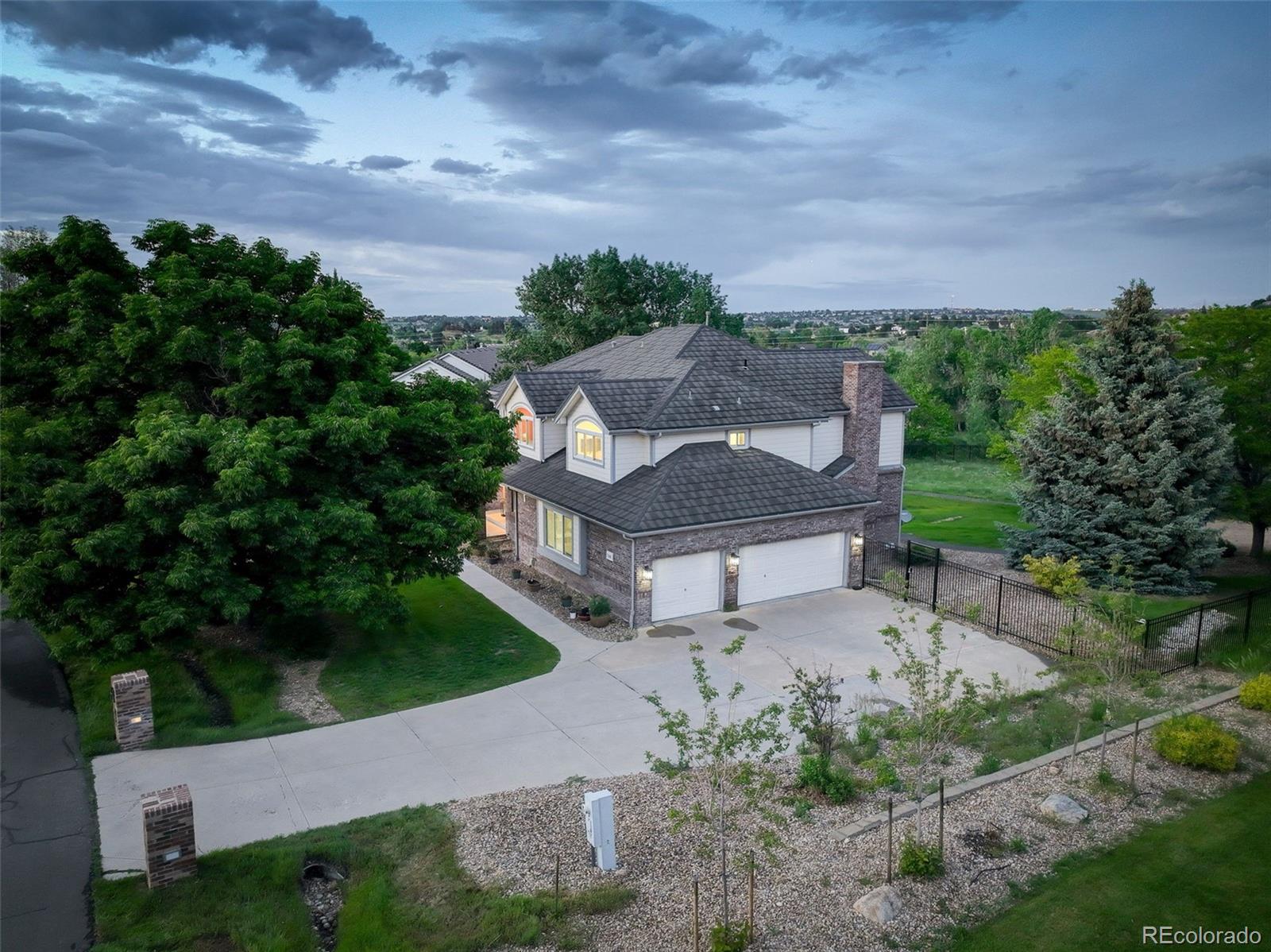 7400 South Genoa Circle Centennial, CO 80016 - Photo 46 of 50 an aerial view of a house with a garden