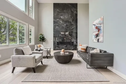 a room with a bed and a table in it