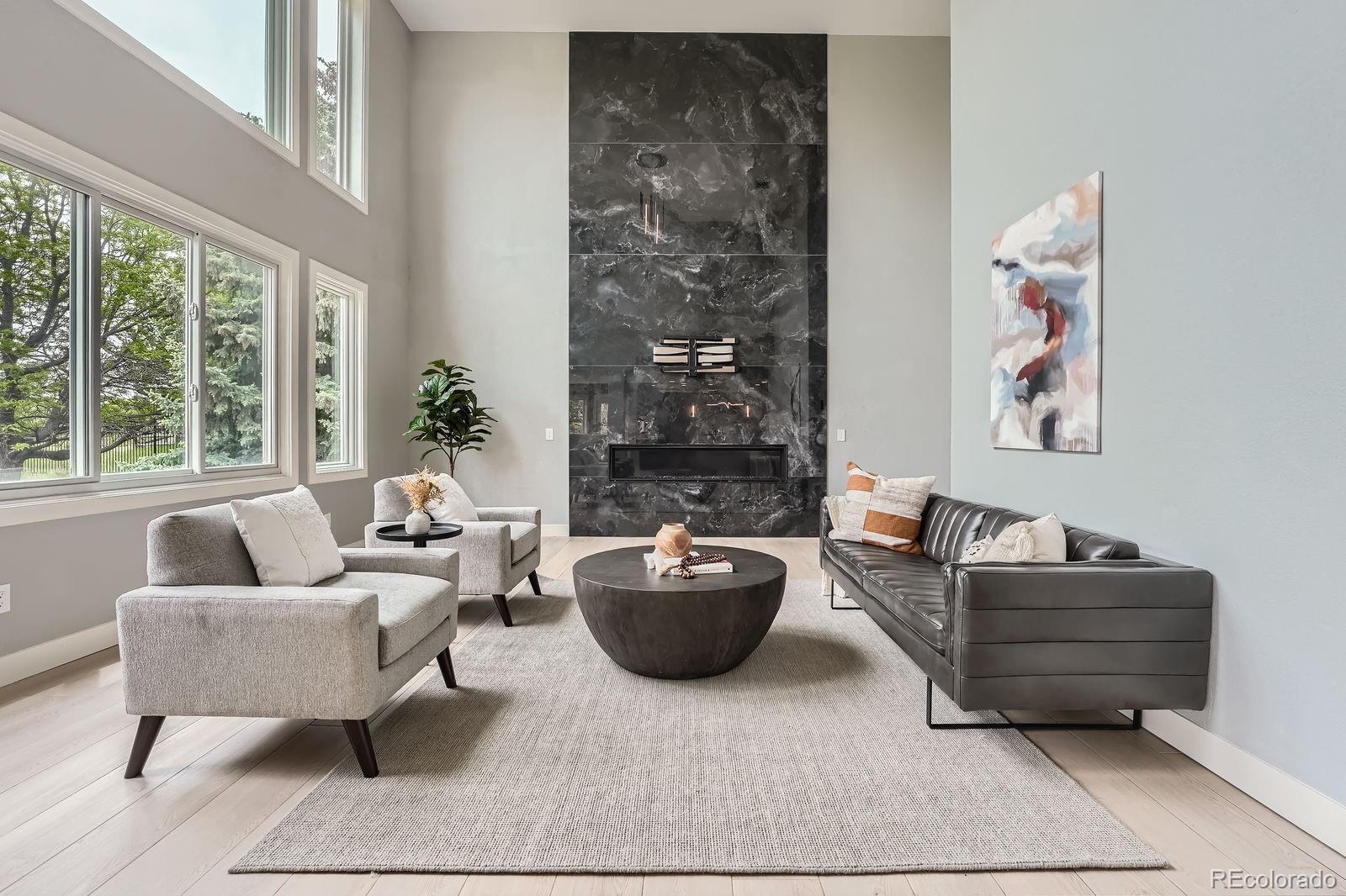 7400 South Genoa Circle Centennial, CO 80016 - Photo 9 of 50 a living room with furniture and a large window