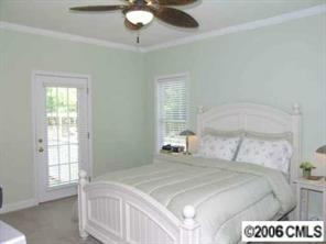 708 Flamingo Road Clover, SC 29710 - Photo 5 of 8 a bedroom with a bed and a window