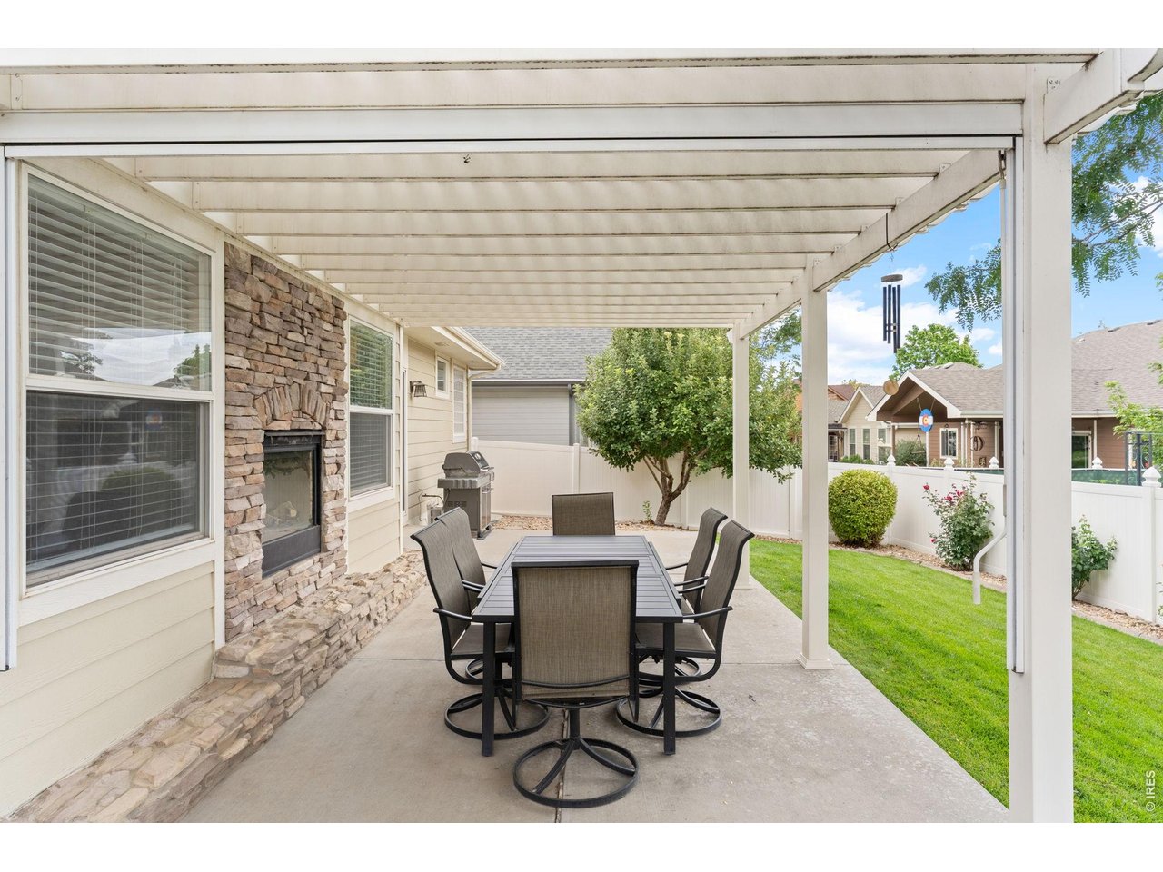 6710 31st St Road Greeley, CO 80634 - Photo 35 of 41 Oversized back patio with Pergola